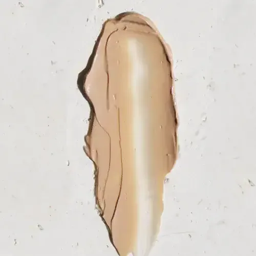 Beige mineral mousse foundation swatch on white