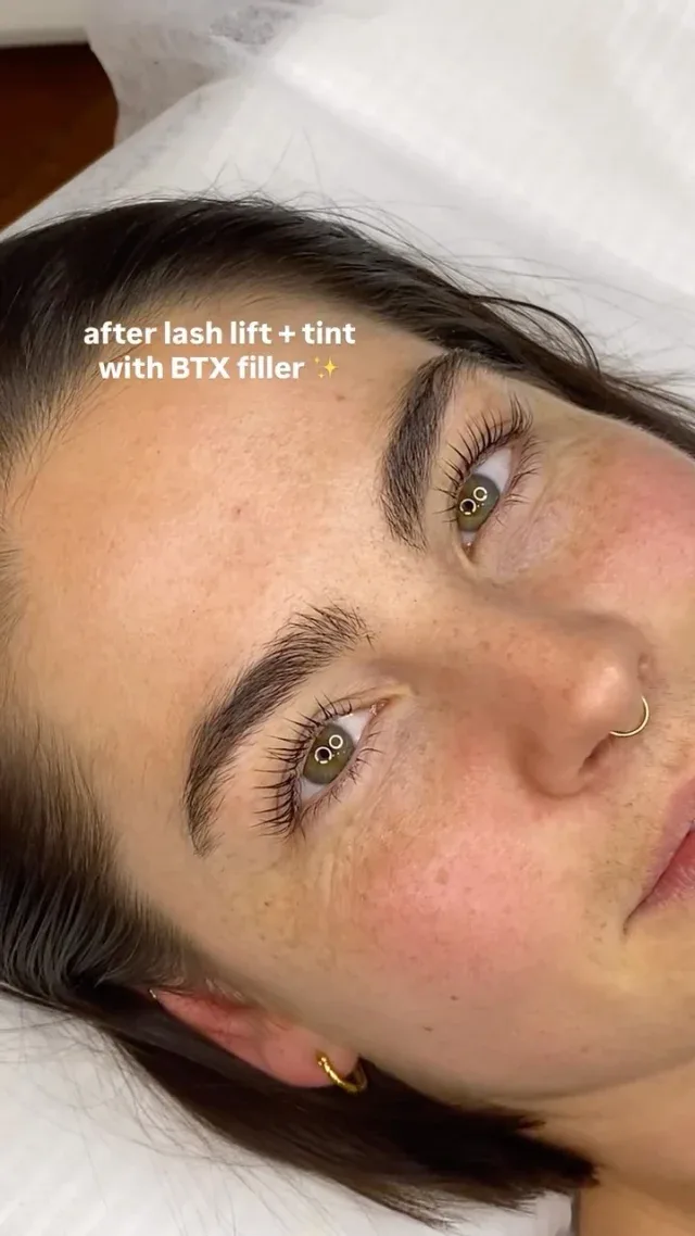 Extreme close-up of freshly lifted, tinted lashes — lash lift and tint with BTX filler result